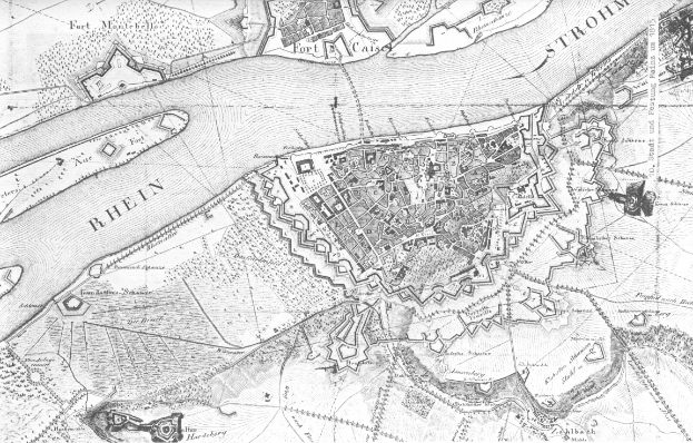 Eine Schwarz-Weiß-Detailkarte der Stadt Rhein, die Straßen, Gebäude und andere Merkmale zeigt, mit Textanmerkungen.