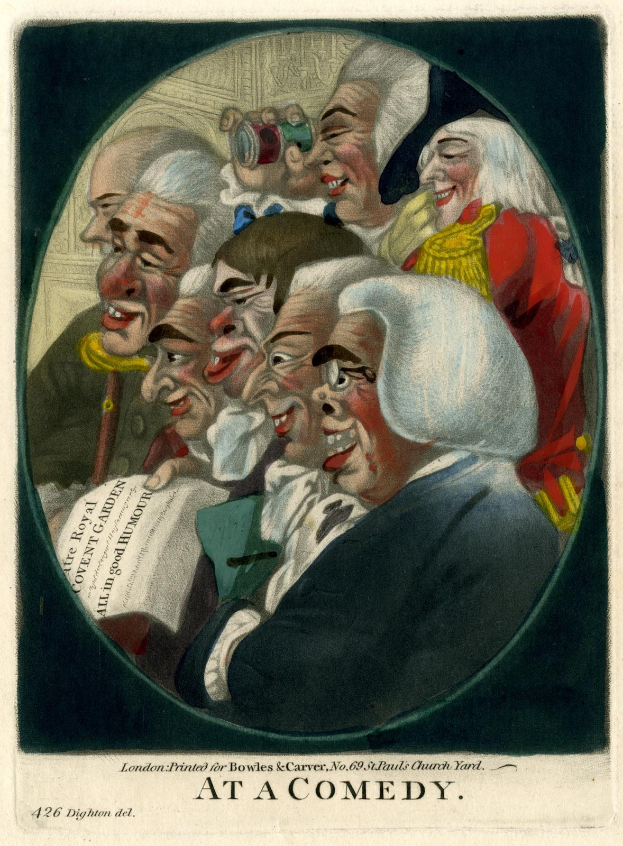 Gruppe von Menschen in einem Kreis lachend, einer hält ein Papier in der Hand, mit Text 'Bei einer Comedy' unten.