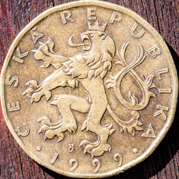 Eine Münze wird präsentiert.